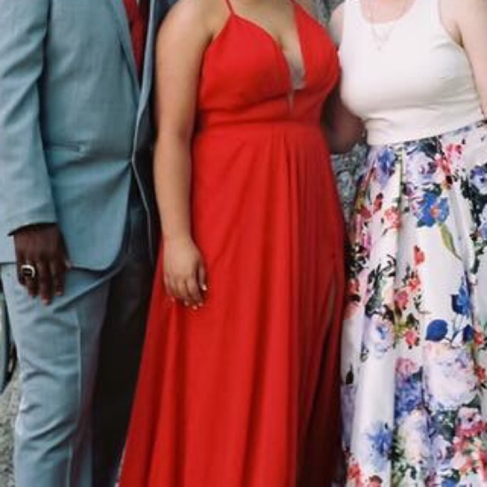 Long red prom dress.